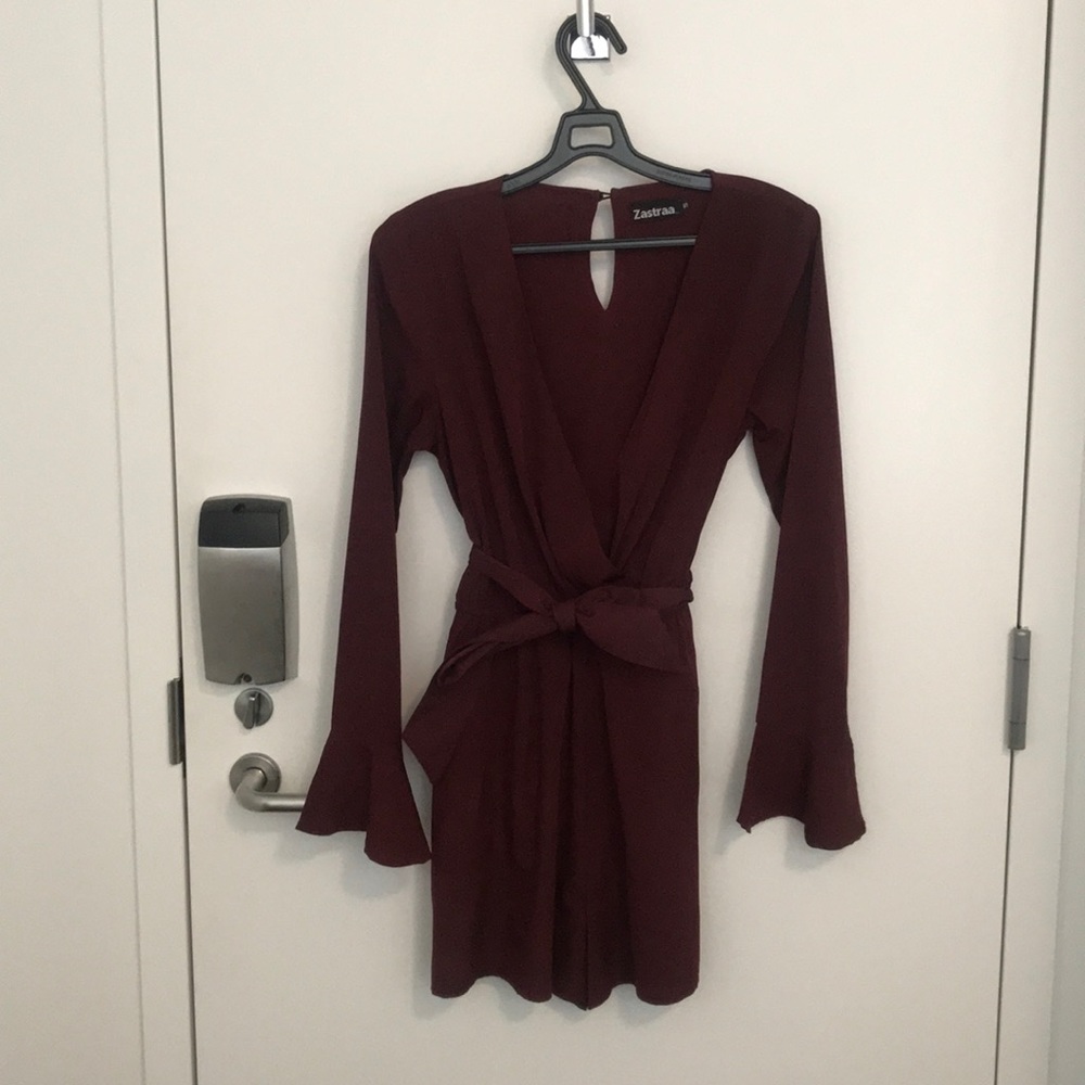 Burgundy colored romper/ jumpsuit